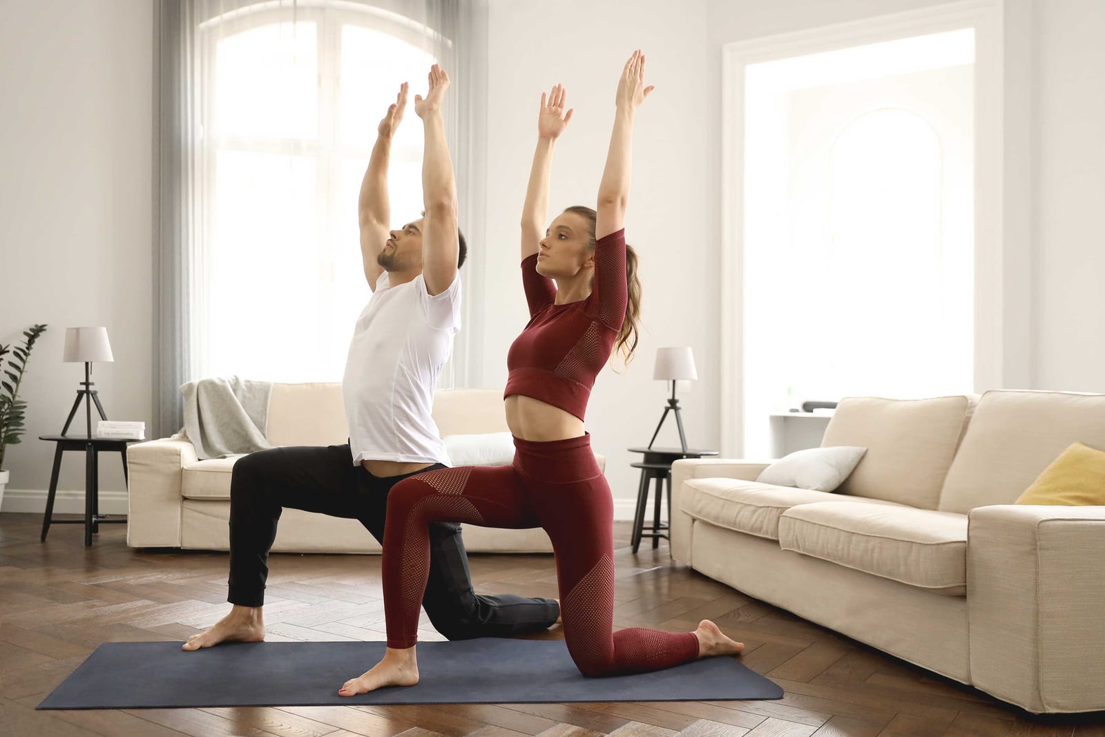 Couple practicing yoga for longevity
