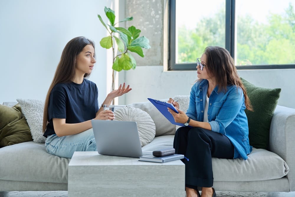 A woman in consultation with her hormone wellness provider